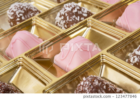 Bonbon sweets candy assortment in box macro photo Bonbon sweets candy assortment in box macro photo 123477846