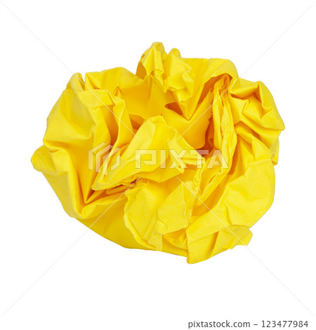 Yellow crumpled craft ball paper isolated on the white background Yellow crumpled craft ball paper isolated on the white background 123477984