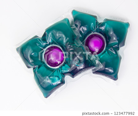 Washing gel capsule powder for cloth isolated on the white background 123477992