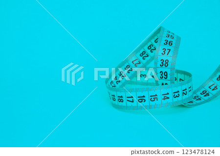 Tape measure sew diet colorful background with copyspace Tape measure sew diet colorful background with copyspace 123478124