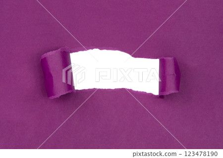 Hole in paper purple background torn damaged for design Hole in paper purple background torn damaged for design 123478190