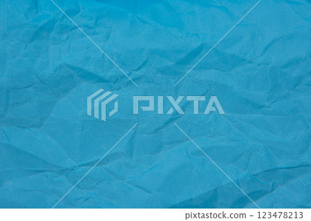 Crumpled blue paper craft textured background 123478213