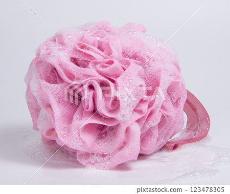 Pink shower sponge for bath isolated on the white background Pink shower sponge for bath isolated on the white background 123478305