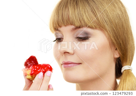 Woman holds cake strawberry cupcake 123479293