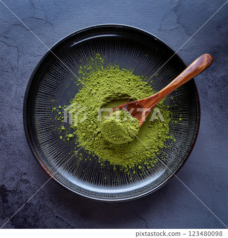Rustic Matcha Powder on Dark Plate 123480098