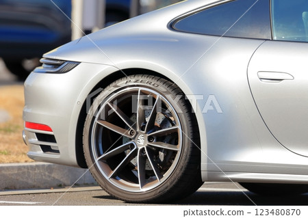 Image of a sports car in a parking lot 123480870