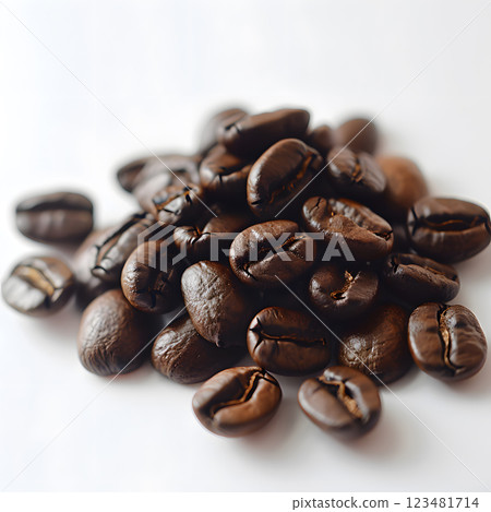Premium roasted coffee beans on white background, perfect for brewing flavorful coffee with rich aroma and caffeine boost. Vibrant organic beans ideal for gourmet morning drink Premium roasted coffee beans on white background, perfect for brewing flavorful coffee with rich aroma and caffeine boost. Vibrant organic beans ideal for gourmet morning drink 123481714