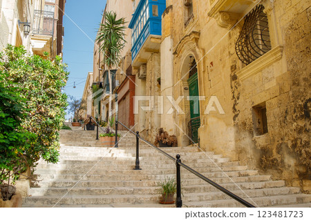 Touristic street with stairs in the center of Valletta, Malta Touristic street with stairs in the center of Valletta, Malta 123481723