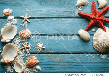 Summer sea background shells, star on a wooden blue background. Summer sea background shells, star on a wooden blue background. 123482800