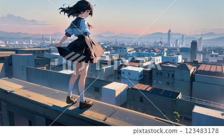 A high school girl looking down on the city from the rooftop A high school girl looking down on the city from the rooftop 123483178