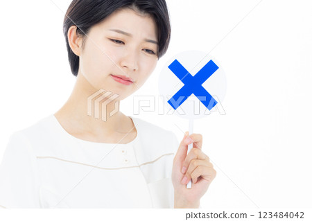 Nurse with wrong answer mark Nurse with wrong answer mark 123484042