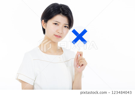Nurse with wrong answer mark Nurse with wrong answer mark 123484043