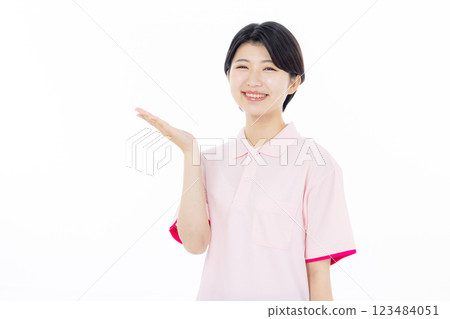 Smiling caregiver giving instructions Smiling caregiver giving instructions 123484051