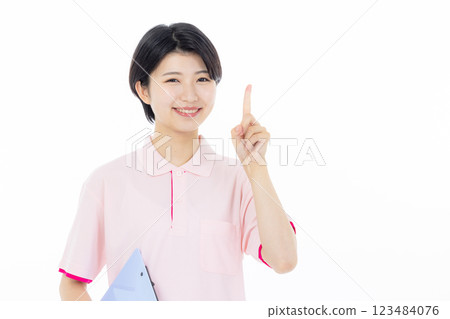 Smiling caregiver giving instructions 123484076