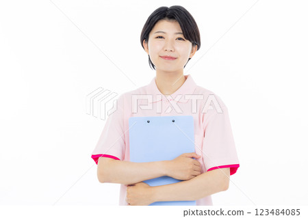 Smiling caregiver giving instructions 123484085