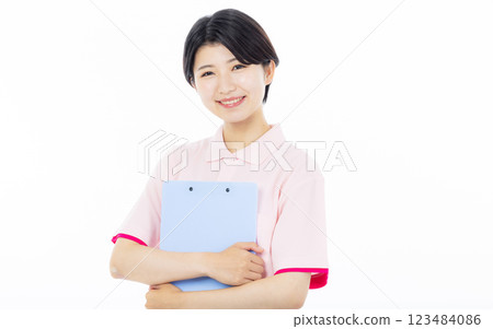 Smiling caregiver giving instructions Smiling caregiver giving instructions 123484086
