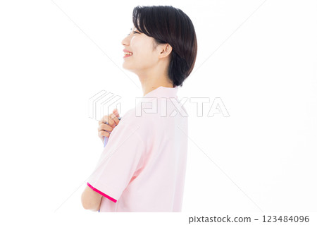 Smiling caregiver giving instructions 123484096
