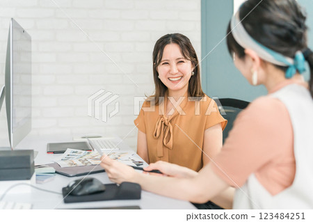 A woman who works as a photo editor, image editor, photo processor, retoucher, and graphic designer A woman who works as a photo editor, image editor, photo processor, retoucher, and graphic designer 123484251