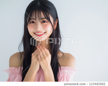 A woman in pink clothes begging for something A woman in pink clothes begging for something 123485802