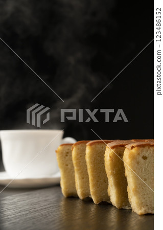 Brandy cake and hot drink 123486152
