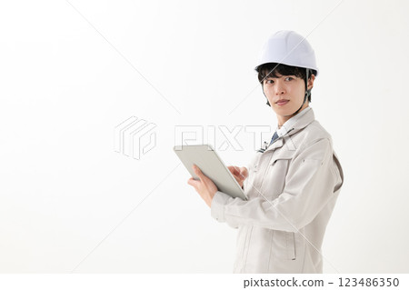 Working clothes men with tablets 123486350