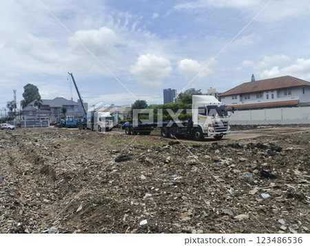 Unidentified truck on construction site in city 123486536