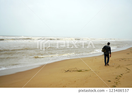Lonely hawker at Puri sea beach during morning time 123486537