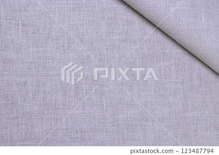 beige hemp viscose natural fabric cloth color; sackcloth rough texture of textile fashion beige hemp viscose natural fabric cloth color; sackcloth rough texture of textile fashion 123487794