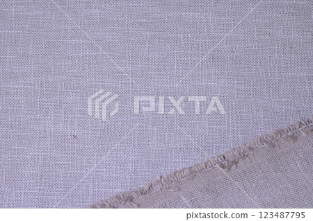 beige hemp viscose natural fabric cloth color; sackcloth rough texture of textile fashion 123487795