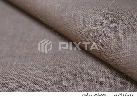 drak brown hemp viscose natural fabric cloth color, sackcloth rough texture of textile fashion 123488182