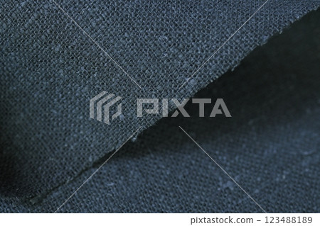dark gray hemp viscose natural fabric cloth color; sackcloth rough texture of textile fashion 123488189