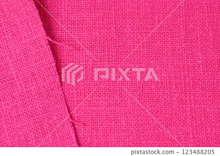 pink hemp viscose natural fabric cloth color, sackcloth rough texture of textile fashion pink hemp viscose natural fabric cloth color, sackcloth rough texture of textile fashion 123488205