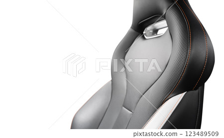 Black leather interior of the luxury modern car. Perforated black leather. Seats with stitching isolated on white background. Modern car interior details. Car inside 123489509
