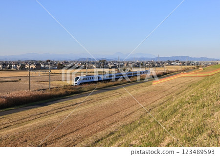 A Spacia X train running on the Tobu Nikko Line in Kazo City, Saitama Prefecture 123489593