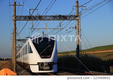 A Spacia X train running on the Tobu Nikko Line in Kazo City, Saitama Prefecture 123489602