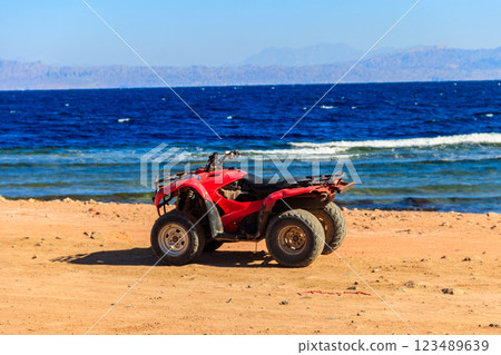 ATV quad bike for safari trips on a shore of the Red Sea in the Gulf of Aqaba. Dahab, Egypt 123489639