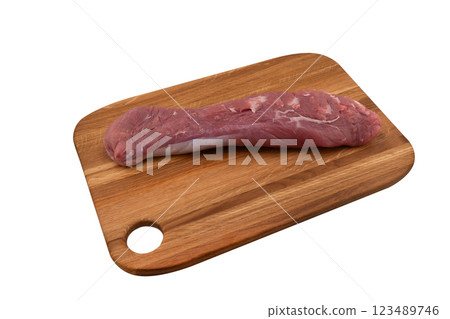 Fresh and raw beef meat on wooden board isolated on white background. Whole piece of tenderloin. Beef meat isolated. Fillet mignon 123489746