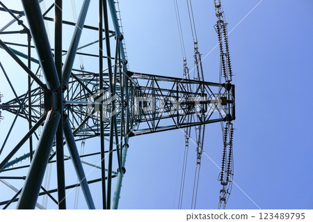 Beautiful symmetrical power transmission tower Beautiful symmetrical power transmission tower 123489795