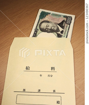 Cash in a pay envelope Cash in a pay envelope 123490367