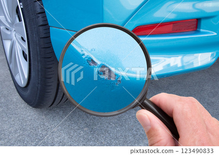 Scratches on the car bumper Scratches on the car bumper 123490833