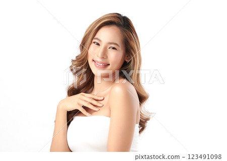 Beautiful young asian woman with clean fresh skin on white background, Face care, Facial treatment, Cosmetology, beauty and spa, Asian women portrait. Beautiful young asian woman with clean fresh skin on white background, Face care, Facial treatment, Cosmetology, beauty and spa, Asian women portrait. 123491098