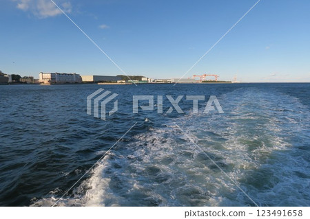 Scenery and wake of a tourist boat touring Yokosuka Naval Port in Yokosuka City, Kanagawa Prefecture Scenery and wake of a tourist boat touring Yokosuka Naval Port in Yokosuka City, Kanagawa Prefecture 123491658