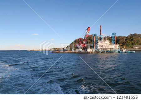 Scenery and wake of a tourist boat touring Yokosuka Naval Port in Yokosuka City, Kanagawa Prefecture Scenery and wake of a tourist boat touring Yokosuka Naval Port in Yokosuka City, Kanagawa Prefecture 123491659