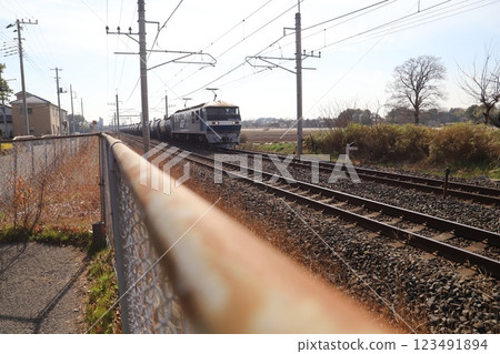 EF210 electric locomotive running near Hasuda City, Saitama Prefecture in winter EF210 electric locomotive running near Hasuda City, Saitama Prefecture in winter 123491894