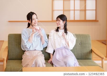 Middle-aged woman having a girls' night out Middle-aged woman having a girls' night out 123492365