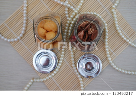Tasty Snacks in Glass Jars with Elegance 123493217