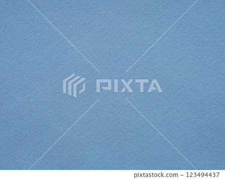 This fine-grained azure felt offers a soothing backdrop, embodying a cool and composed visual serenity 123494437