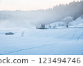 Ojiya City, Niigata Prefecture, Iiyama Line: A single-car train running through the snowy fields of fog and morning glow 123494746