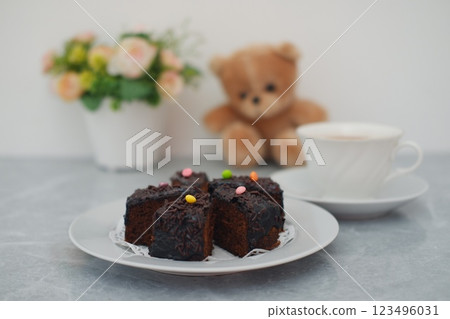 Sweet Moments with Chocolate Cake and Coffee 123496031