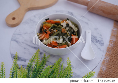 Colorful Veggie Delight in a White Bowl 123496036